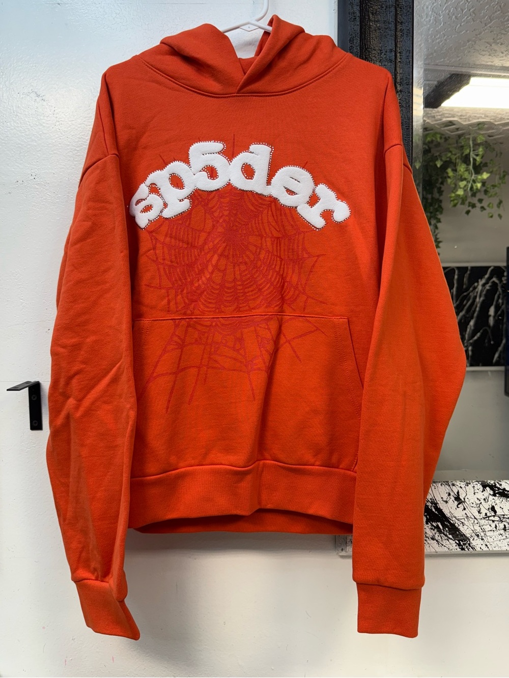 Sp5der Faded Orange Rhinestone Hoodie with Spiderweb Detail hoodie